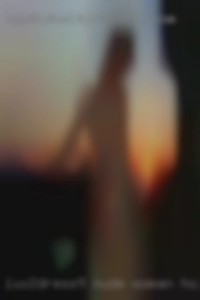 Luv2dress9 nude woman holding penis